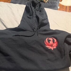 Kruger Black Hoodie with Red Emblem